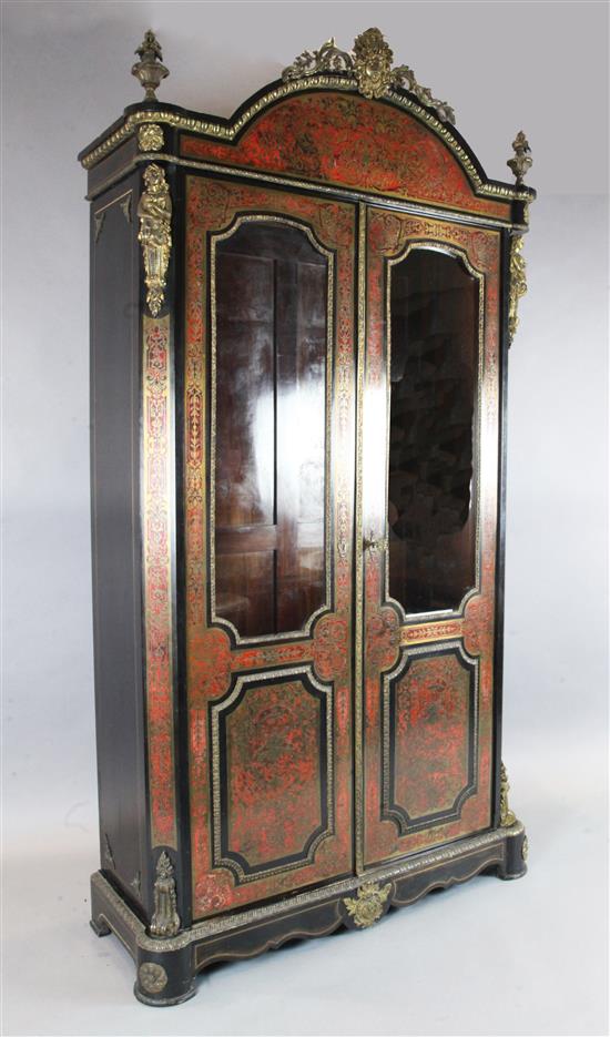 A mid 19th century French red boulle work and ebony bookcase, W.4ft 1in. D.1ft 6in. H.7ft 10in.
